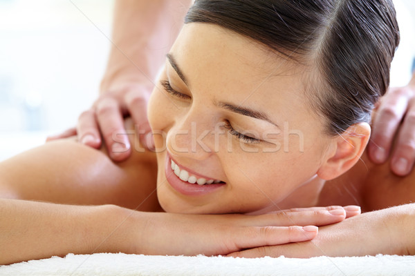 Godimento sorridere femminile massaggio Foto d'archivio © pressmaster