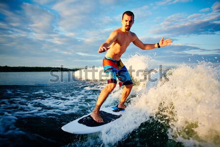 Woman on surfboard Stock photo © pressmaster