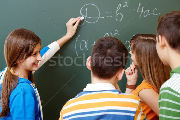 Magyarázat diák magyaráz képlet iskolatábla algebra Stock fotó © pressmaster