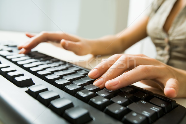 Stock photo: Hands typing