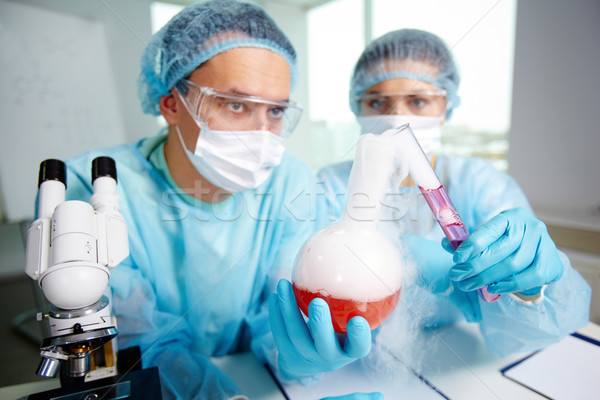 лаборатория рабочие два химического эксперимент женщину Сток-фото © pressmaster