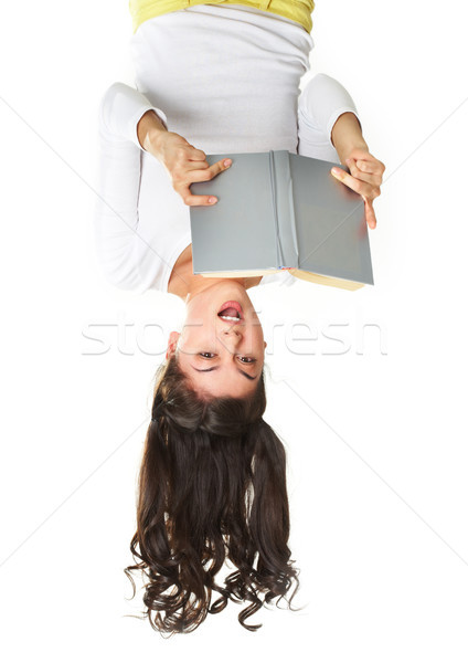 Opwindend verwonderd teen lezing boek ongebruikelijk Stockfoto © pressmaster