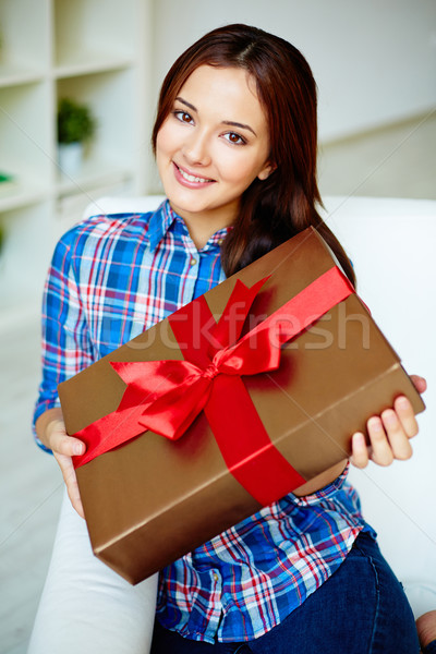 Girl with gift Stock photo © pressmaster