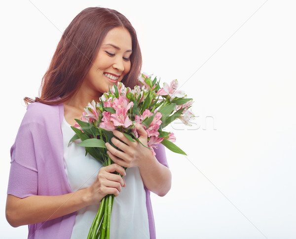 Virág élvezet portré bájos női néz Stock fotó © pressmaster