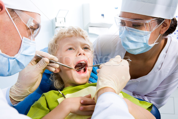 Inspectie oraal holte tandheelkundige weinig jongen Stockfoto © pressmaster