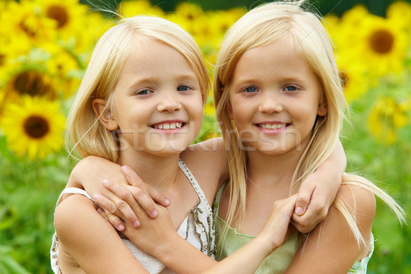 Hugging sisters Stock photo © pressmaster