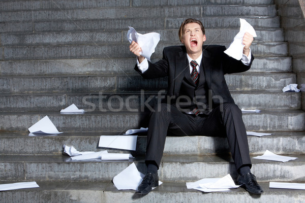 Verzweiflung Bild Geschäftsmann weinen Papiere Hände Stock foto © pressmaster