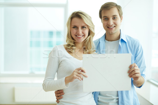 Hirdetés kép fiatal fickó barátnő mutat Stock fotó © pressmaster