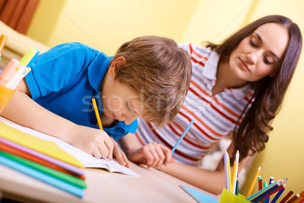 Schoolwork with mother Stock photo © pressmaster