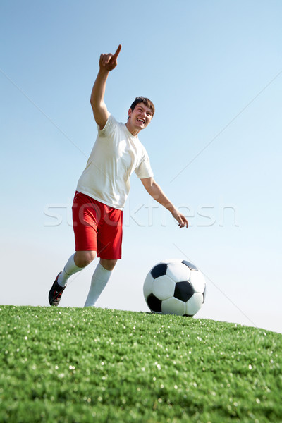 Fotbalist joacă imagine fotbal Imagine de stoc © pressmaster
