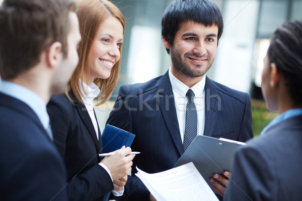 Tárgyalás csoport üzleti partnerek tárgyal üzlet nő Stock fotó © pressmaster