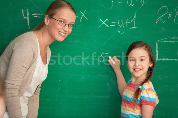 Equazione ritratto Smart insegnante studentessa piedi Foto d'archivio © pressmaster