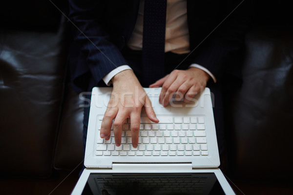 Stock photo: Businessman typing