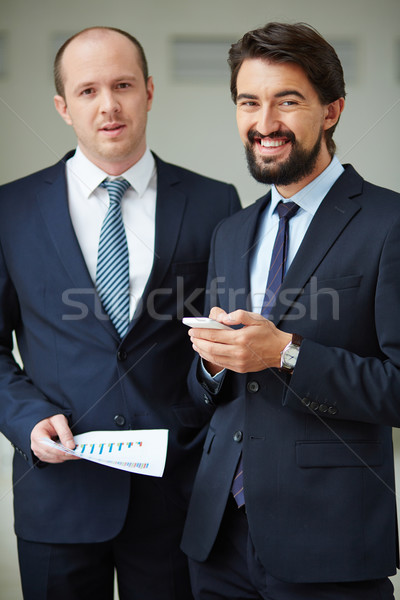 Elegante afbeelding twee zakenlieden naar camera Stockfoto © pressmaster