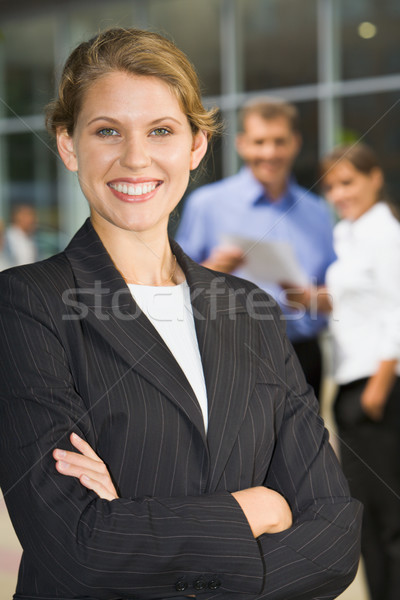 Businesswoman with folded arms Stock photo © pressmaster