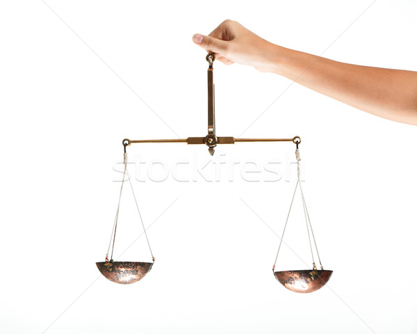 Hand with scales Stock photo © pressmaster