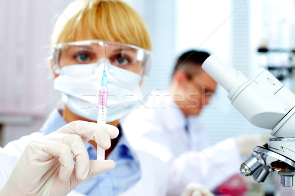Stockfoto: Injectie · man · geneeskunde · verpleegkundige · laboratorium · vrouwelijke