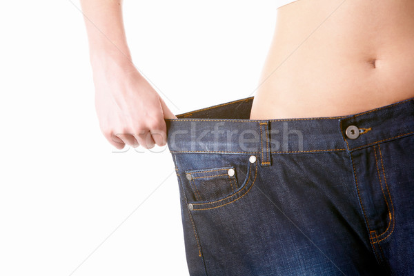 Jeans schlank weiblichen tragen groß Stock foto © pressmaster