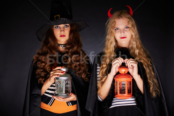 Halloween filles portrait deux lanternes regarder Photo stock © pressmaster