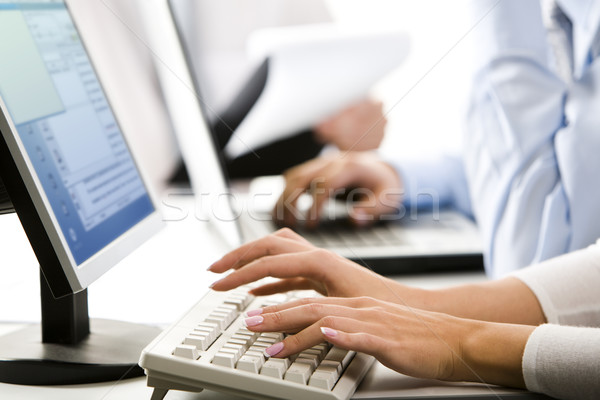 Female hands typing Stock photo © pressmaster