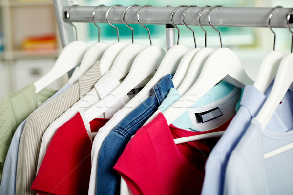 Stock photo: Clothes on hangers