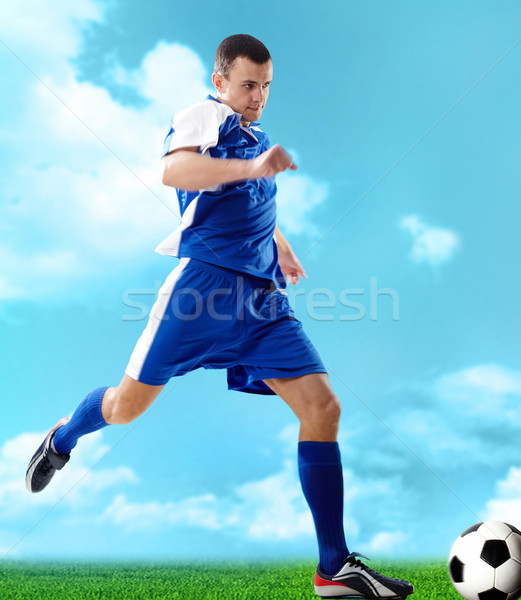 Facet portret piłkarz piłka niebieski Zdjęcia stock © pressmaster