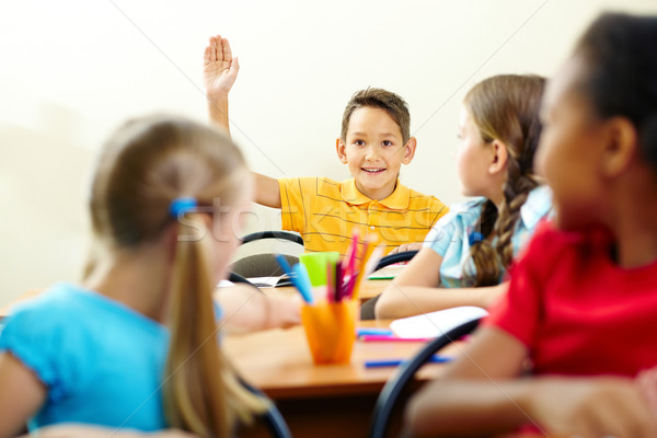 Stock photo: Boy raising arm