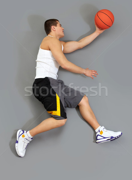 Reaching for ball Stock photo © pressmaster