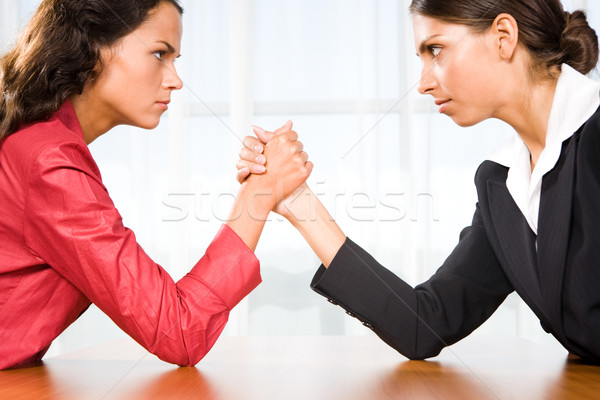 Mulheres lutar perfil duas mulheres brasão negócio Foto stock © pressmaster