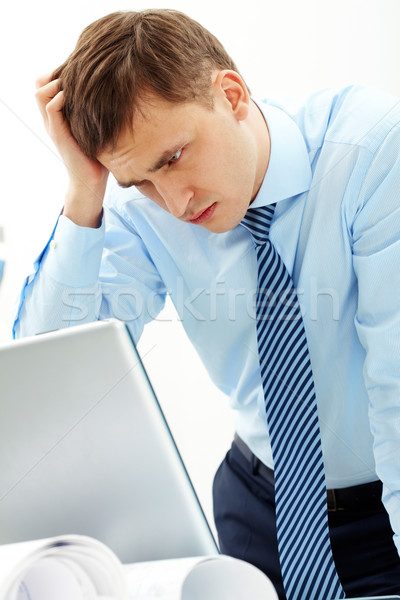 Stock photo: Man using laptop