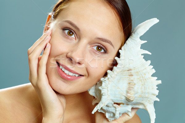 Stock photo: Girl with shell 