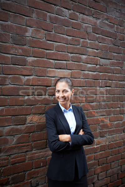 Gelukkig werkgever afbeelding zakenvrouw permanente muur Stockfoto © pressmaster