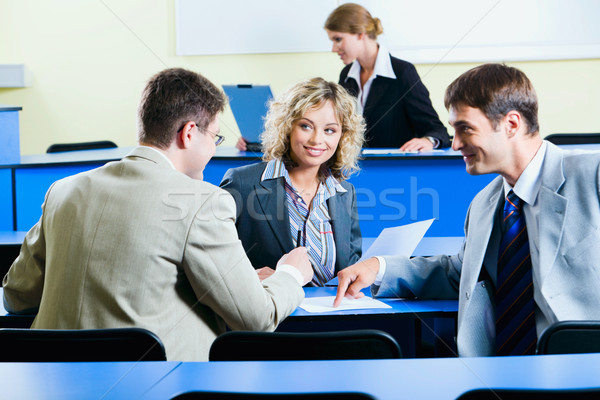 Groupe de gens séance bleu table affaires [[stock_photo]] © pressmaster