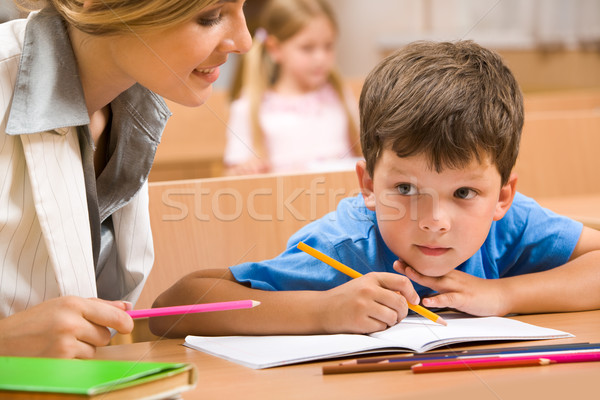 Tanár fotó iskolás fiú ül együtt asztal Stock fotó © pressmaster