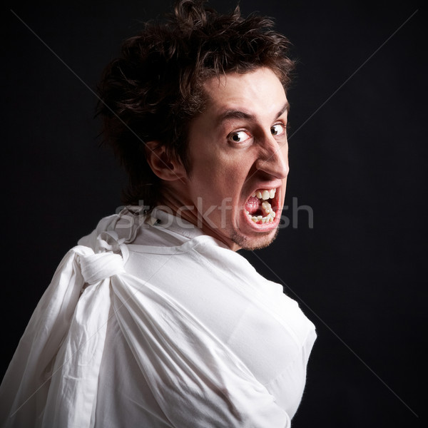 Insano raiva homem gritando isolamento pessoa Foto stock © pressmaster