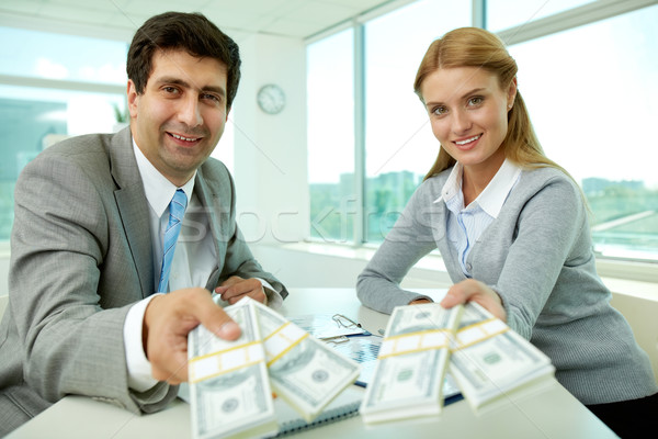 Kedvesség kettő üzleti partnerek munkahely pénz néz Stock fotó © pressmaster