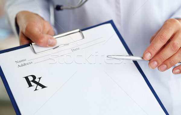 Foto stock: Indicação · mão · feminino · médico · caneta · clipboard