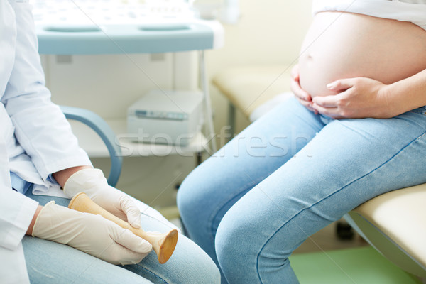 Arts patiënt zwangere jonge vrouw vergadering Stockfoto © pressmaster