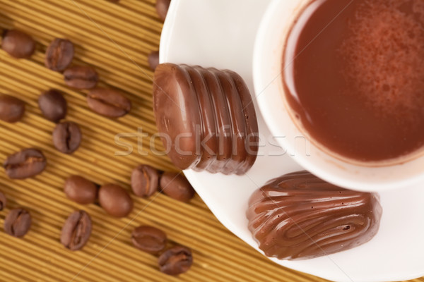 Cappuccino and chocolates Stock photo © pressmaster