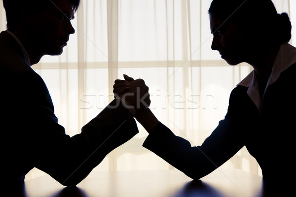 Rivalité silhouette affaires concurrents bras de fer bureau Photo stock © pressmaster
