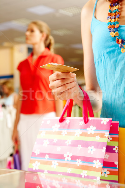 Fogyasztói társadalom közelkép nő pénz háttér táska Stock fotó © pressmaster