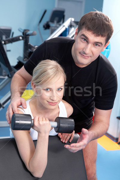 фитнес тренер человека помогают женщину девушки Сток-фото © pressmaster