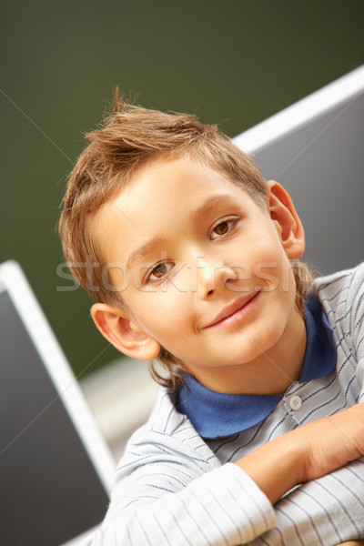 Schoolboy in classroom Stock photo © pressmaster