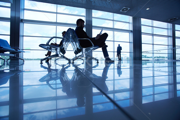 Attente avion deux lecture aéroport [[stock_photo]] © pressmaster