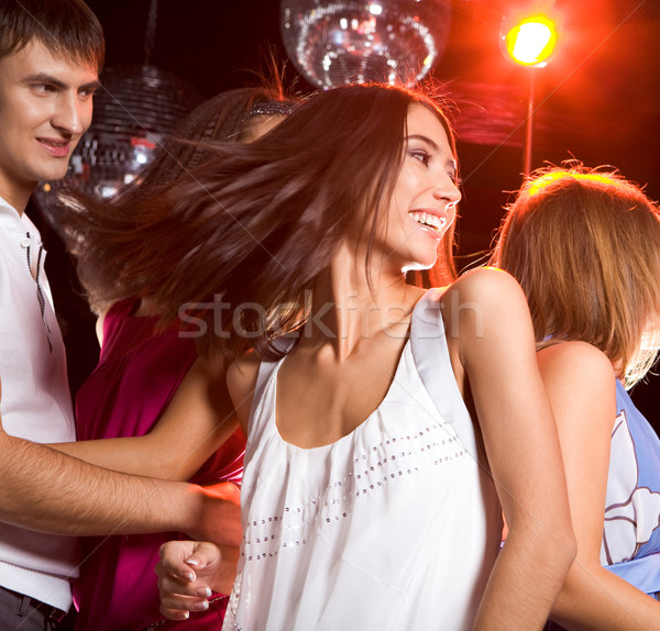 Energic dans fotografie fată Dansuri club de noapte Imagine de stoc © pressmaster