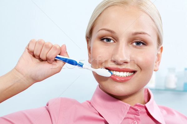 Stock photo: Cleaning teeth
