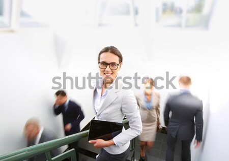 Elegáns üzletasszony portré okos néz kamera Stock fotó © pressmaster