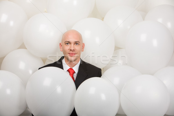 [[stock_photo]]: Souriant · homme · ballons · affaires · fête · visage