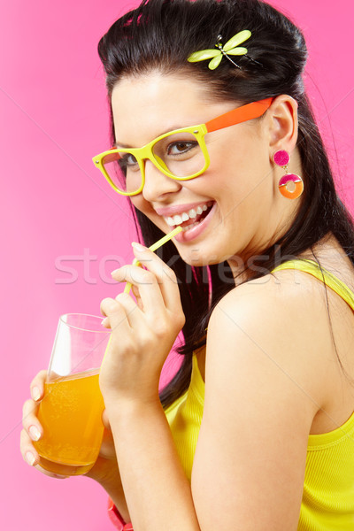 женщину напиток портрет красивая женщина питьевой оранжевый Сток-фото © pressmaster