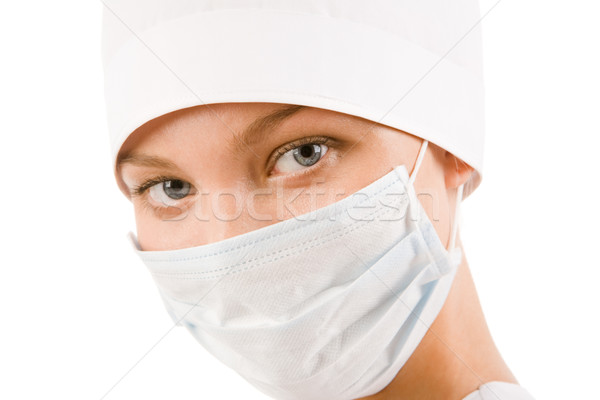 Verpleegkundige gezicht steriel masker naar camera Stockfoto © pressmaster